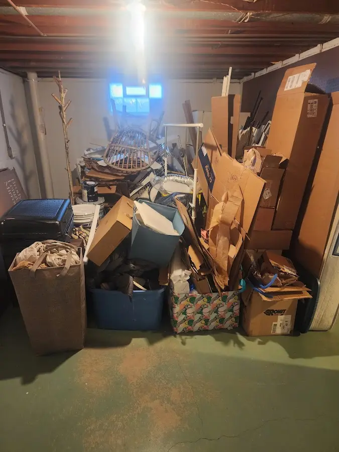 Roll-off dumpster container at job site for Construction Dumpster Rental in Adams